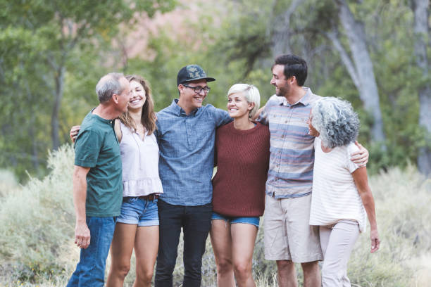 istock Multi-generational of friends posing together outside 1157863989