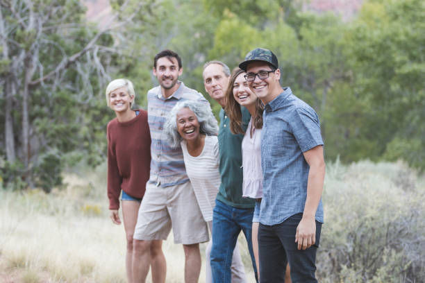 istock Multi-generational of friends posing together outside 1157863990