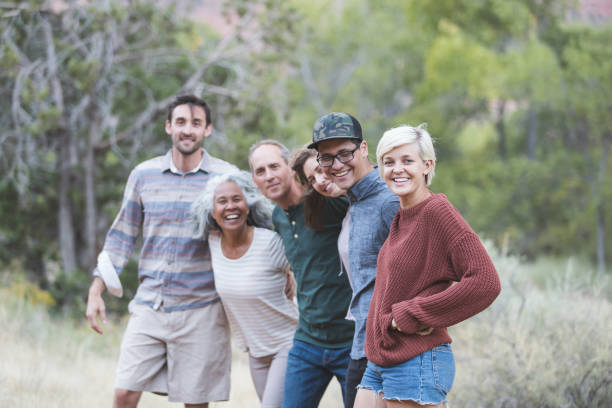 istock Multi-generational of friends posing together outside 1157863991