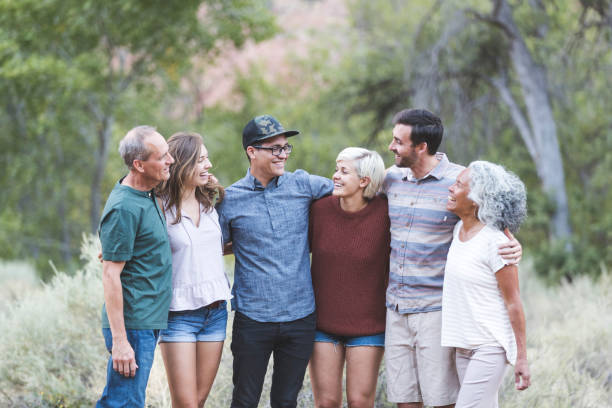 istock Multi-generational of friends posing together outside 1157863996