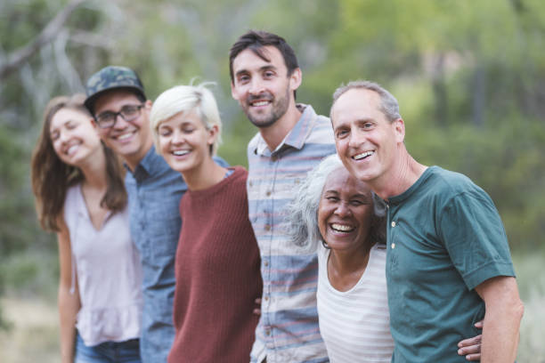 istock Multi-generational of friends posing together outside 1157864001