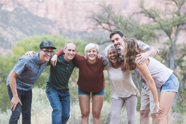 istock Multi-generational of friends posing together outside 1157864003