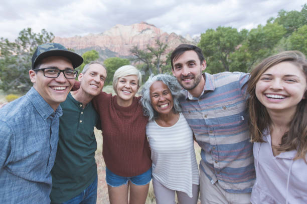 istock Multi-generational of friends posing together outside 1157864007