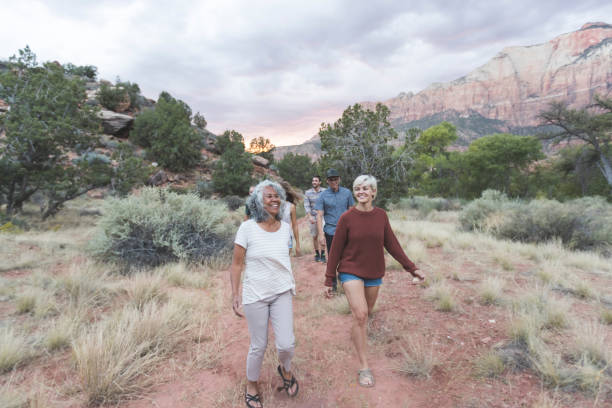 Multi-generational group of hikers in the Utah desert
