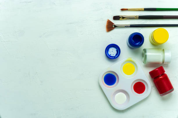 istock Palette and watercolor with paint brush on white background. 1157864539