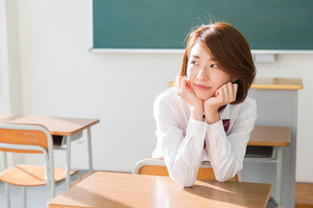 istock asian school girl, 1157873925