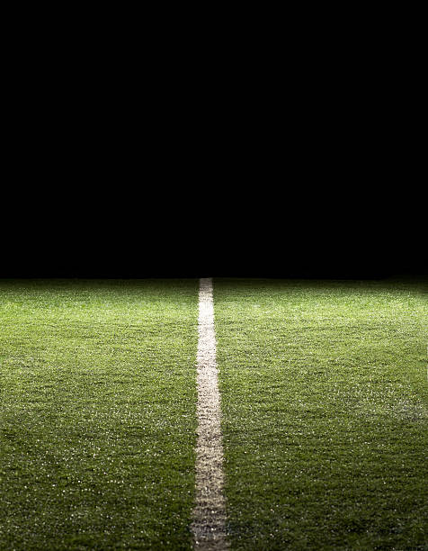 istock Line on a Football Field at night 115787469