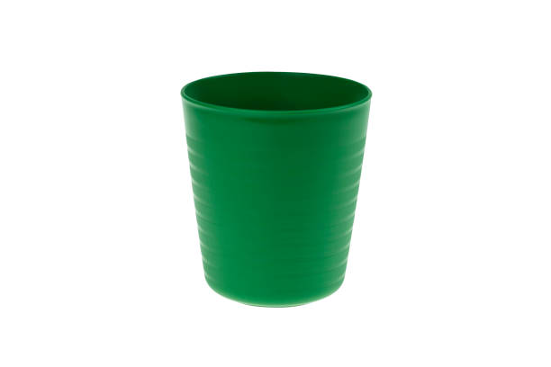 istock Green plastic glass isolated on white background 1157875174