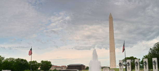 istock Washington monument in front of reflecting pool 1157875348