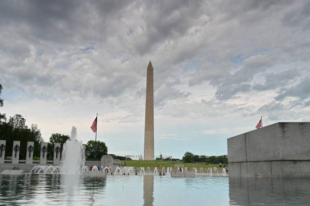 istock Washington monument in front of reflecting pool 1157875503