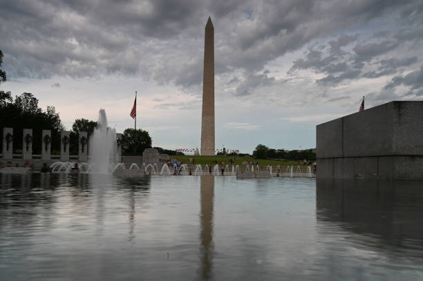 istock Washington monument in front of reflecting pool 1157875556