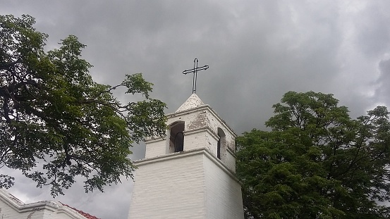 Church in Merlo, San Luis, Argentina, over a stormy and grey sky.