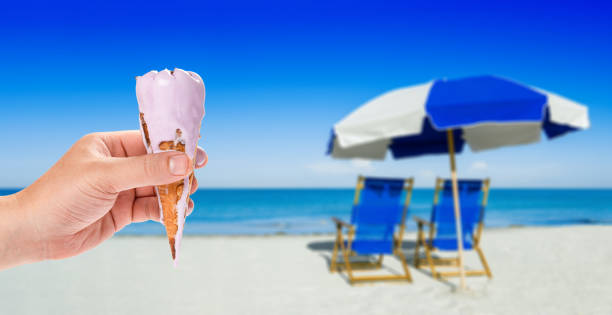 istock sun loungers and a beach umbrella on silver sand,  vacation concept 1157877532
