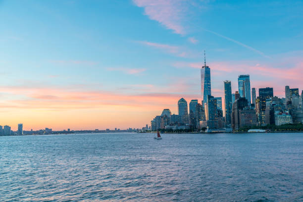 istock View of Downtown Manhattan With Lights on Building Still On During Sunrise 1157879455