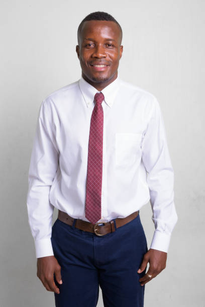 istock Happy young African businessman smiling 1157880456
