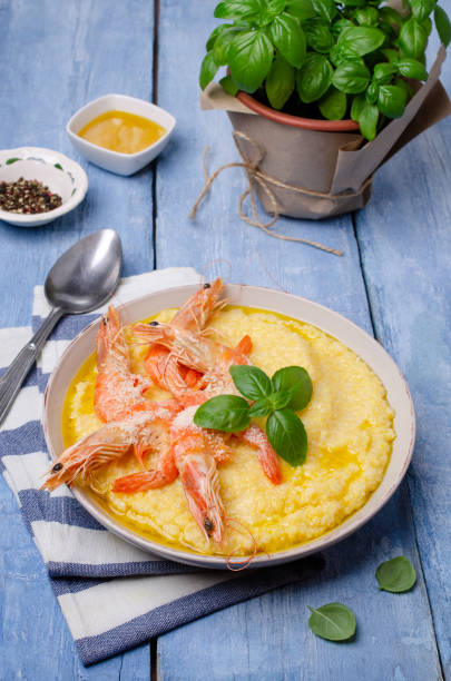 istock Large untreated shrimp with polenta 1157882463
