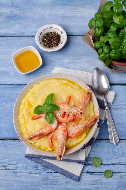 istock Large untreated shrimp with polenta 1157882503