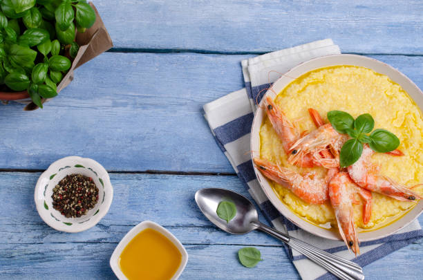 istock Large untreated shrimp with polenta 1157882519