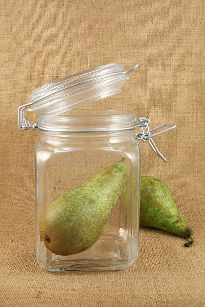pears in a glass  jar stock photo
