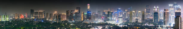 istock Panoramic Jakarta skyline with urban skyscrapers at night 1157889296