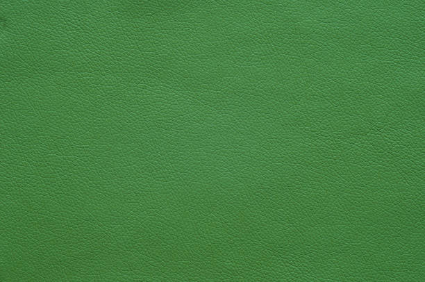 istock Large texture of bright green artificial leather. 1157895273