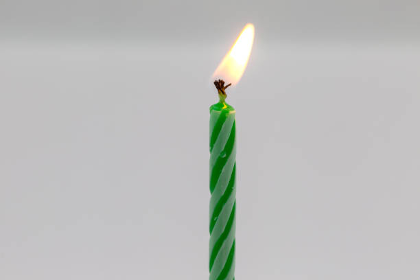 istock Green birthday candle 1157895303