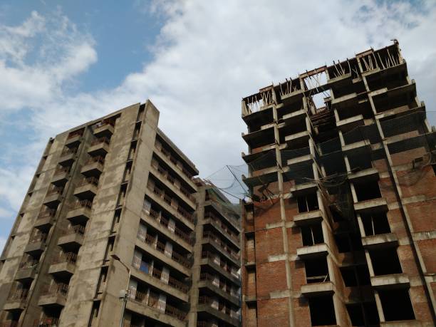 istock New residential building construction site with scaffolding close up 1157895308