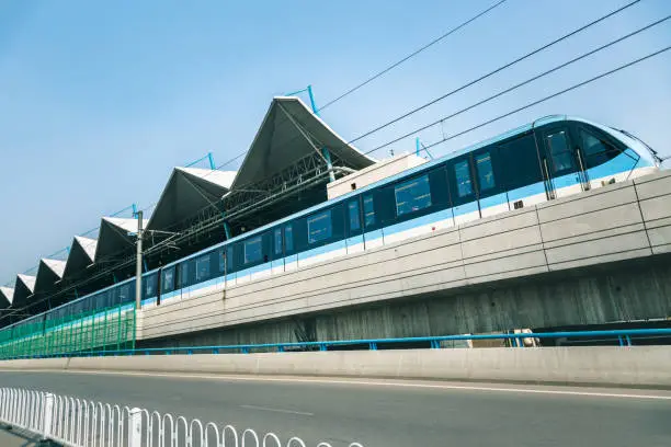 passenger train moving in city,tianjin,china.