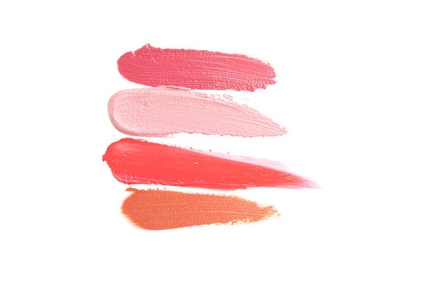 istock Lipstick smears isolated on white background. Makeup products 1157899304