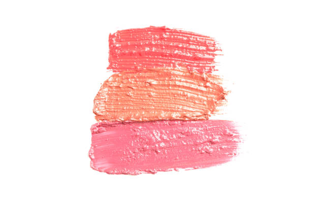 istock Lipstick smears isolated on white background. Makeup products 1157899438