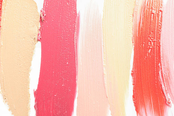 istock Liquid foundation smears as background. Makeup products 1157900217