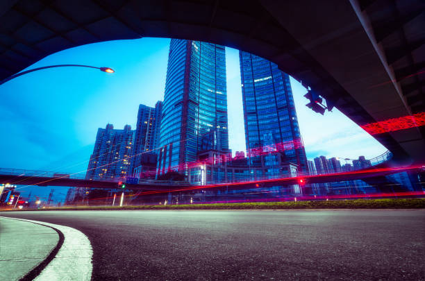 istock low angle view of modern towers against sky 1157900220