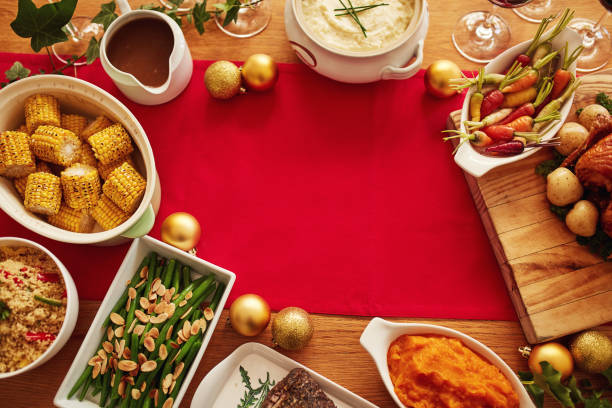 Plate served with fork and knife and Christmas decoration
