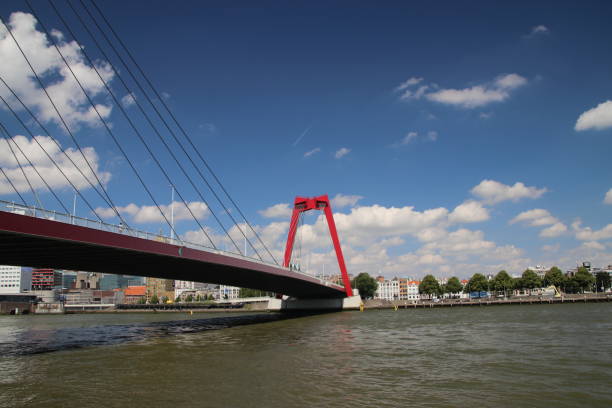 istock Red colored Willems bridge over River Nieuwe Maas in Rotterdam 1157906352