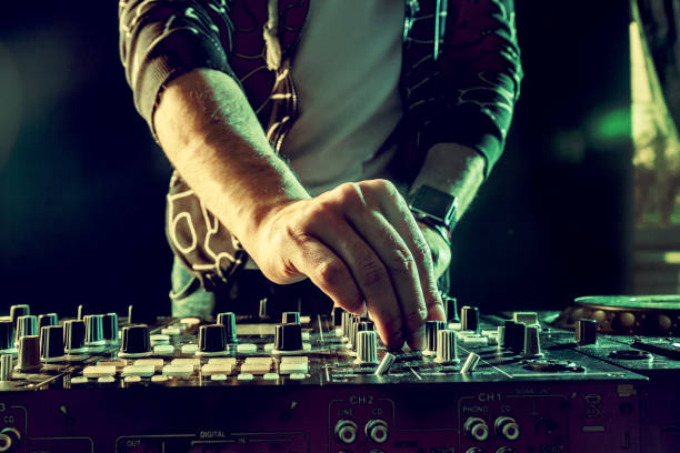 istock DJ playing music at mixer closeup 1157906486