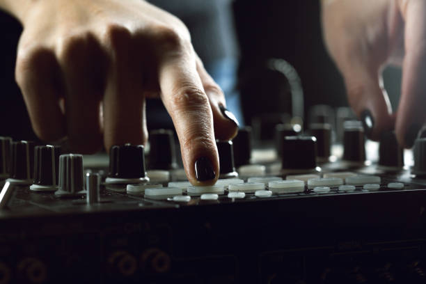 istock DJ playing music at mixer closeup 1157906605