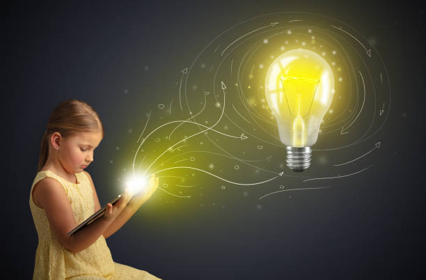 istock Girl holding tablet with new idea concept 1157907643
