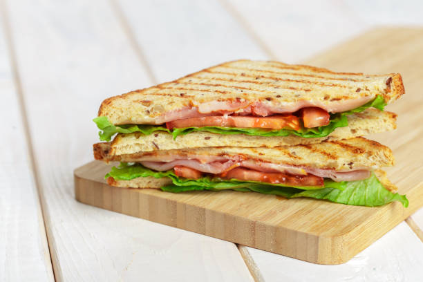 istock Club sandwich on wooden table 1157909388