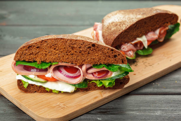 istock sandwich on a wooden table 1157910794