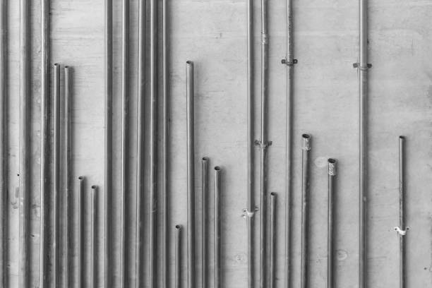 steel electric conduit pipes, black and white tone, selective focus, industry concept background