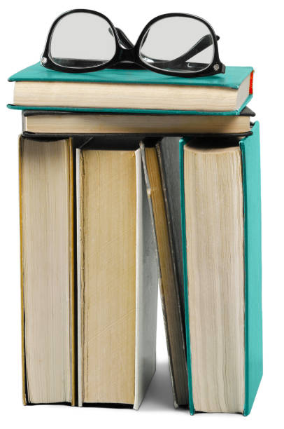 istock Pile of old books isolated on white 1157915826