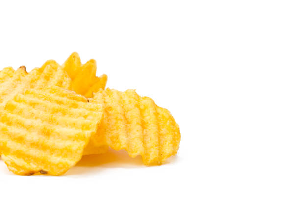 istock yellow potato chips isolated on white 1157915927