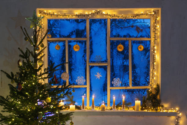 istock Christmas decorations on old wooden window 1157916186