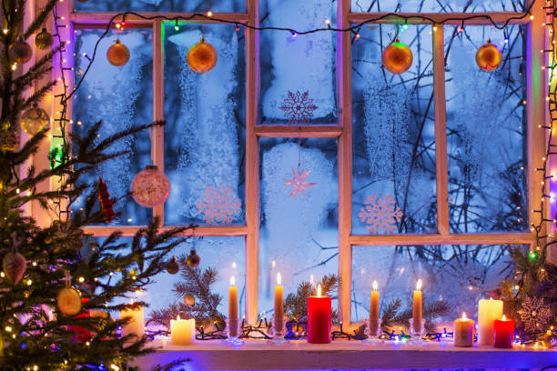 istock Christmas decorations on old wooden window 1157916196