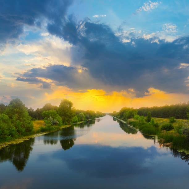 quiet evening scene, irrigation channel at the sunset