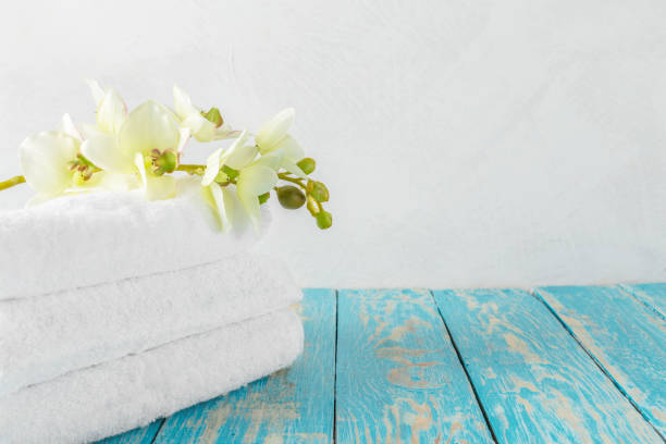 istock towels with orchid flower 1157917185
