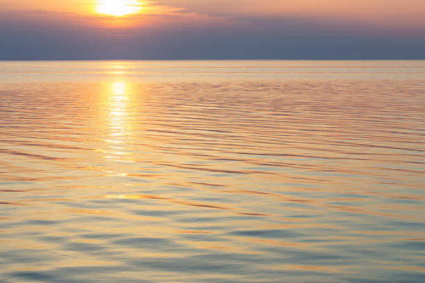 istock beautiful summer sunset on lake 1157918563