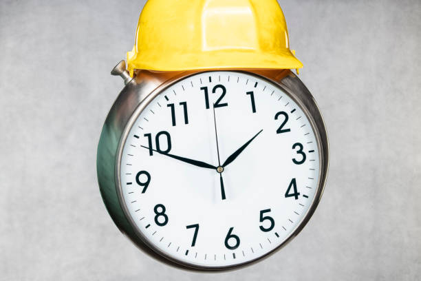 clock in the helmet, protection of time clock in the helmet, protection of time delayed sign photos stock pictures, royalty-free photos & images