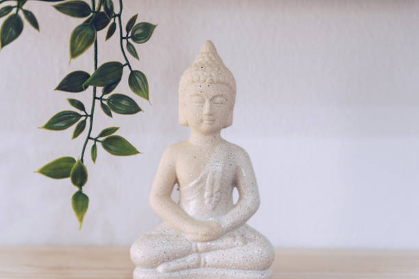 istock White Buddha isolated in white background 1157920488