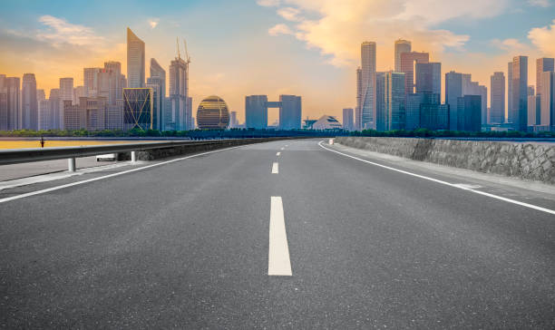 istock Road Pavement and Hangzhou Architectural Landscape Skyline 1157921272